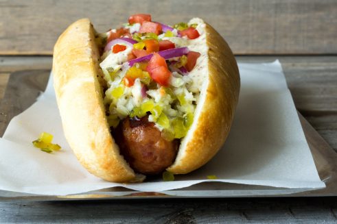 atlanta style hot dog topped with coleslaw